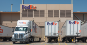 FedEx freight trucks parked outside parcel carrier facility