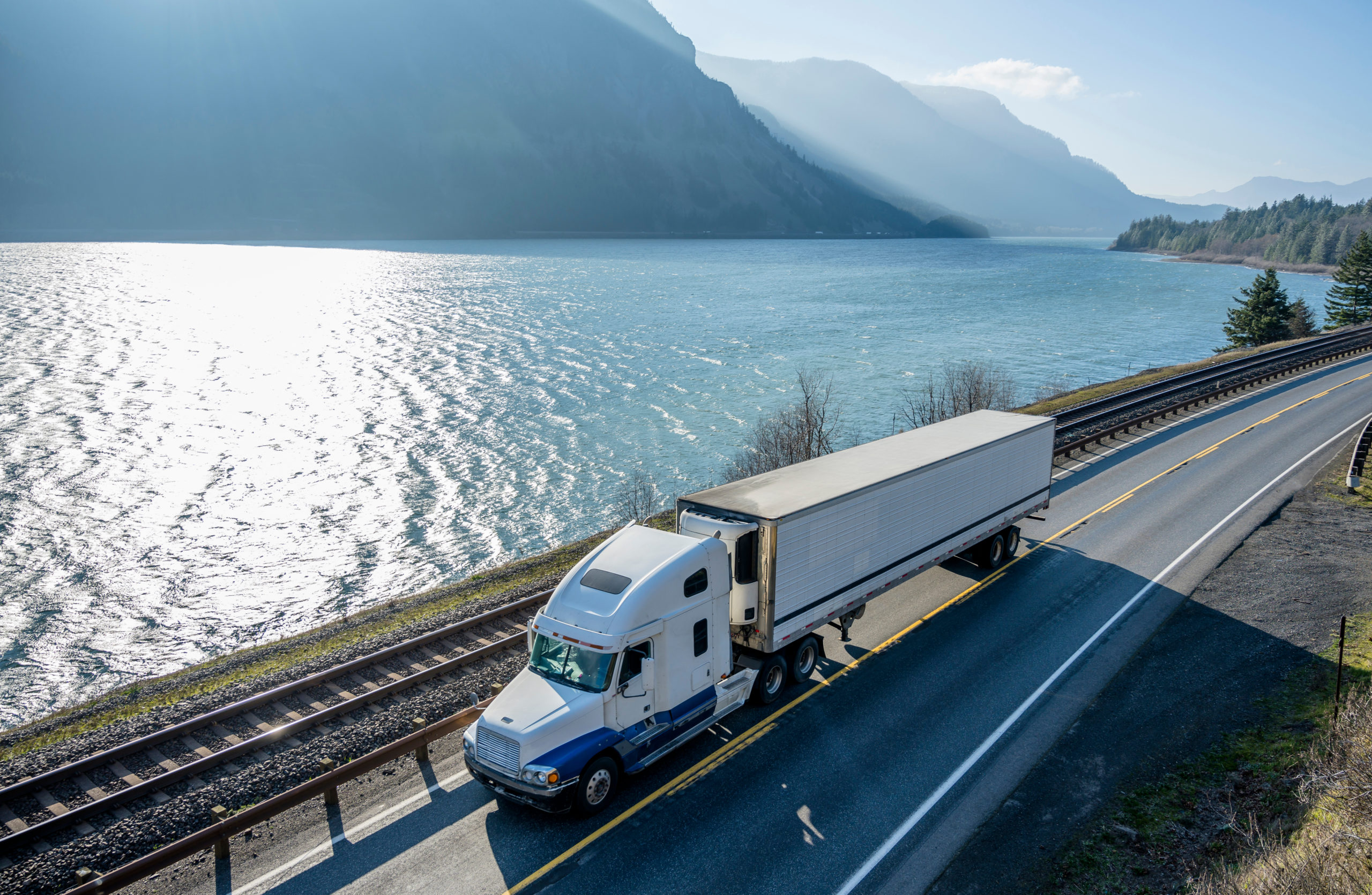 Freight truck transporting cargo across a bridge
